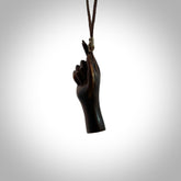 Hand carved hard wood number one hand pendant. Carved by NZ Pacific and for sale online. Unique, handmade jewellery.